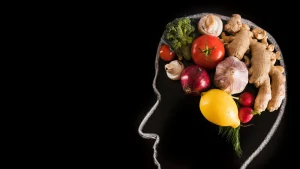 Vegetables arranged in the shape of a human brain, representing nutrition and cognitive health