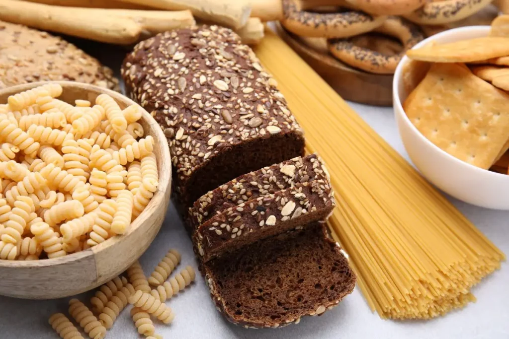 Processed grain foods including pasta, crackers, and bread high in refined carbohydrates
