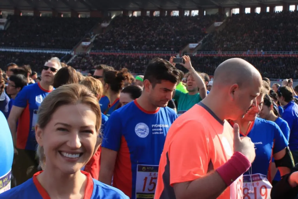 Jennifer Stevens participating in an international marathon while embracing an active and wellness-focused lifestyle