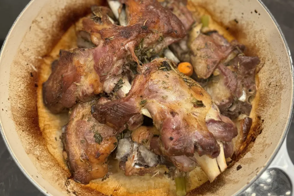 Slow-roasted meat and vegetables prepared as a nourishing homemade meal.
