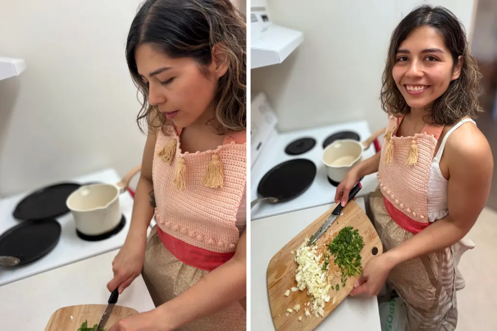Ximena Vidaurre Leyva preparing a homemade meal and chopping fresh vegetables in the kitchen.