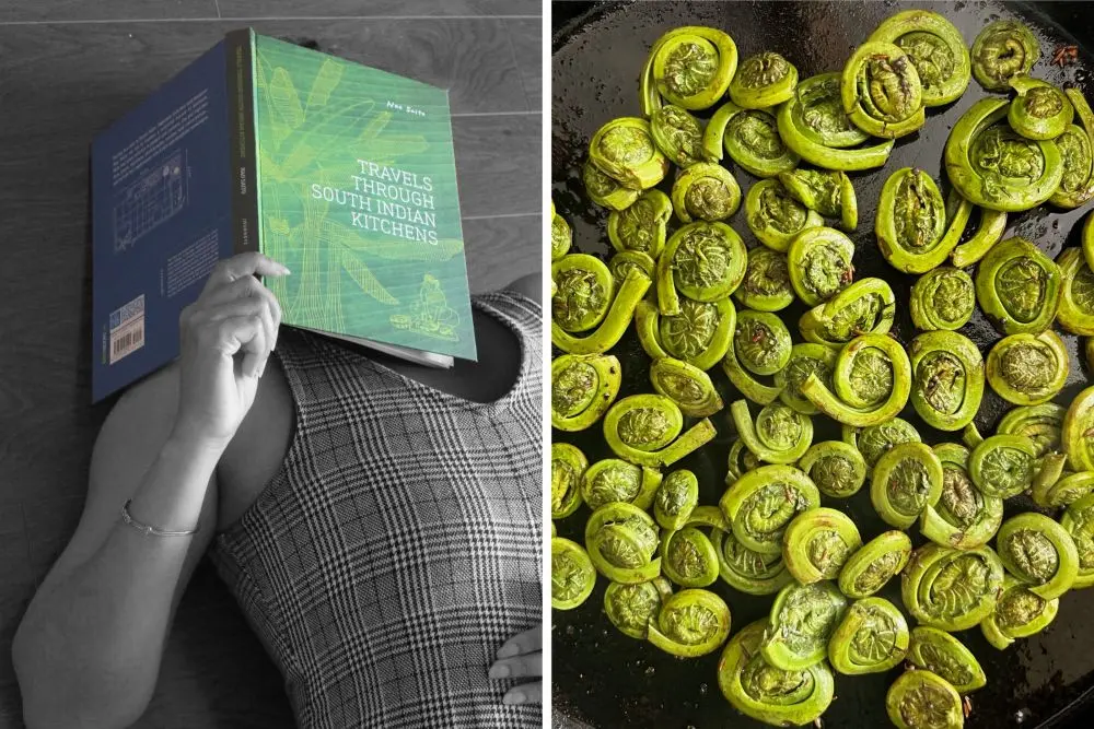 Anupama Kakarala reading a South Indian cookbook alongside fresh green vegetables used in traditional home cooking.